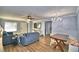 Open living and dining area with wood floors at 86 Winter Ridge Rd # 86, Winter Haven, FL 33881