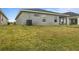 Spacious backyard with grassy area at 1042 Corso Dr, Winter Haven, FL 33884