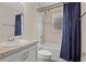 Clean bathroom with a tub, shower, and updated vanity at 1042 Corso Dr, Winter Haven, FL 33884