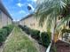 Exterior view of the side of the home with landscaping at 1068 Stoney Creek Dr, Lakeland, FL 33811