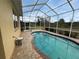 View of the pool and patio area with a pool cleaning system at 1068 Stoney Creek Dr, Lakeland, FL 33811