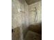 The shower stall has tiled walls, a shower bar, and a shower head at 1068 Stoney Creek Dr, Lakeland, FL 33811