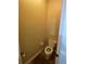 The half-bath has neutral paint and toilet at 1068 Stoney Creek Dr, Lakeland, FL 33811