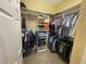 This walk-in closet boasts a range of shelving options, including rods, cubbies and shelves at 1068 Stoney Creek Dr, Lakeland, FL 33811