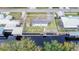 Bird's-eye view of the property, highlighting its waterfront location at 13901 Hatchineha Rd, Haines City, FL 33844