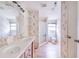 Bathroom with double vanity and a walk-in shower at 13901 Hatchineha Rd, Haines City, FL 33844