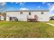 Single-wide manufactured home with a spacious yard at 13901 Hatchineha Rd, Haines City, FL 33844