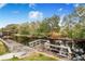 Nice waterfront view with a wooden dock at 13901 Hatchineha Rd, Haines City, FL 33844