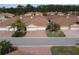 Aerial view of a community of villas with brown roofs at 1649 Linz Ct, Winter Haven, FL 33884