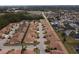 Aerial view of a residential community with houses and landscaping at 1649 Linz Ct, Winter Haven, FL 33884