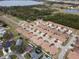 Aerial view of community near a lake with many houses and green space at 1649 Linz Ct, Winter Haven, FL 33884