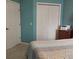 Bright bedroom with double door closet and view at 1649 Linz Ct, Winter Haven, FL 33884