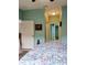 Second bedroom with a view of the hallway and bathroom at 1649 Linz Ct, Winter Haven, FL 33884