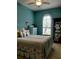 Charming bedroom with a ceiling fan and large window at 1649 Linz Ct, Winter Haven, FL 33884