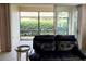 Relaxing patio with sliding glass doors and lush greenery at 1649 Linz Ct, Winter Haven, FL 33884