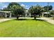Charming house with manicured lawn at 1663 W Lake Cannon Nw Dr, Winter Haven, FL 33881
