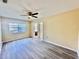 Inviting room features new flooring, a ceiling fan and French doors at 1663 W Lake Cannon Nw Dr, Winter Haven, FL 33881