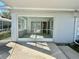 Screened porch with sliding glass doors at 1663 W Lake Cannon Nw Dr, Winter Haven, FL 33881