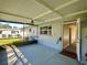 Bright screened porch with exterior access at 1663 W Lake Cannon Nw Dr, Winter Haven, FL 33881
