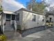 Side view of the house with landscaping at 205 Maple W St, Davenport, FL 33837