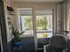 Bright screened porch with view of backyard at 205 Maple W St, Davenport, FL 33837