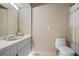 Simple bathroom with single vanity, toilet, and shower at 2300 N Scenic Hwy # 37, Lake Wales, FL 33853