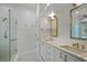 Elegant bathroom with double vanity, large shower, and marble tile at 2300 N Scenic Hwy # 37, Lake Wales, FL 33853