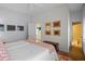 Bright bedroom with twin beds, and access to a private bath at 2300 N Scenic Hwy # 37, Lake Wales, FL 33853