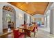 Bright dining room with a long wooden table and red chairs at 2300 N Scenic Hwy # 37, Lake Wales, FL 33853