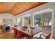 Elegant dining room with large wooden table and access to backyard at 2300 N Scenic Hwy # 37, Lake Wales, FL 33853