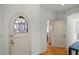 Elegant entryway with arched door and wood flooring at 2300 N Scenic Hwy # 37, Lake Wales, FL 33853