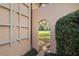 Charming garden path leading to grassy backyard at 2300 N Scenic Hwy # 37, Lake Wales, FL 33853