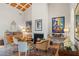 Living room with hardwood floors, fireplace, and beamed ceiling at 2300 N Scenic Hwy # 37, Lake Wales, FL 33853