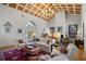 Spacious living room with high ceilings, hardwood floors, and a cozy fireplace at 2300 N Scenic Hwy # 37, Lake Wales, FL 33853