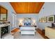 Main bedroom with wood ceilings, fireplace and hardwood floors at 2300 N Scenic Hwy # 37, Lake Wales, FL 33853