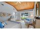 Main bedroom with water views, wood ceilings and fireplace at 2300 N Scenic Hwy # 37, Lake Wales, FL 33853