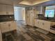 Modern kitchen with white cabinets and granite countertops at 2314 York Pl, Lakeland, FL 33810