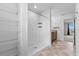 Bathroom featuring a shower and wire shelving at 245 Hillcrest Dr, Dundee, FL 33838