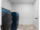 Neat laundry room with modern washer and dryer at 245 Hillcrest Dr, Dundee, FL 33838