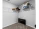 Spacious walk-in closet with shelving and a TV at 245 Hillcrest Dr, Dundee, FL 33838