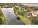 Waterfront property with canal views and lush landscaping at 2683 Wyndsor Oaks Way, Winter Haven, FL 33884