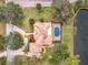 Bird's eye view of the home showcasing the pool and landscaping at 2683 Wyndsor Oaks Way, Winter Haven, FL 33884