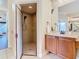 Walk-in shower with glass enclosure in main bathroom at 2683 Wyndsor Oaks Way, Winter Haven, FL 33884