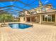 Enjoy this beautiful pool and spacious patio, perfect for entertaining at 2683 Wyndsor Oaks Way, Winter Haven, FL 33884