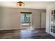 Spacious bedroom with large window and hardwood floors at 3340 Crump Rd, Winter Haven, FL 33881