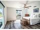 Serene bedroom with hardwood flooring and a wooden bed frame at 3340 Crump Rd, Winter Haven, FL 33881