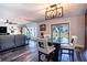 Bright dining area with water views and seating for four at 3340 Crump Rd, Winter Haven, FL 33881