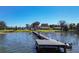 Lakefront property with a long wooden dock at 3340 Crump Rd, Winter Haven, FL 33881