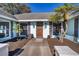 House entrance, showcasing a wooden door and walkway at 3340 Crump Rd, Winter Haven, FL 33881