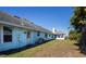 House exterior showcasing a side view and backyard at 3340 Crump Rd, Winter Haven, FL 33881